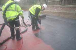 maclennan engineers applying polyprufe spray deck waterproofing hampstead